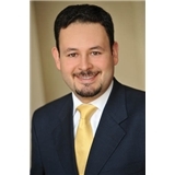 Dr. Carlos Castro, DDS
