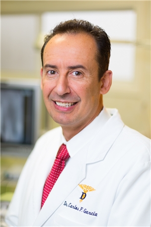 Dr. Carlos Garcia, DDS