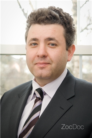 Dr. Dmitry Kucher, DDS