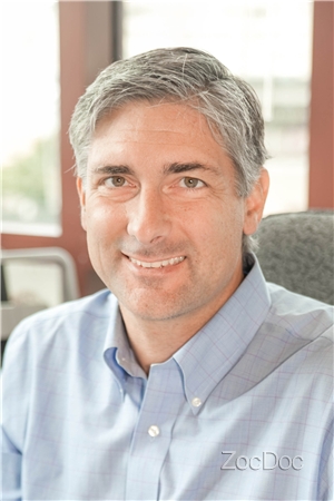 Dr. John Velyvis, MD
