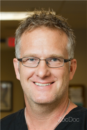 Dr. Michael E. Muncy, DO