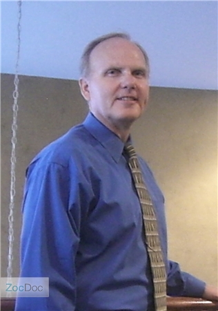 Dr. Paul L. Woolf, OD