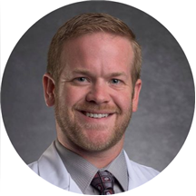 Dr. Travis Tomek, MD