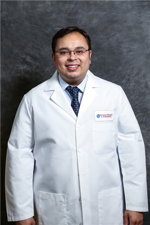 Dr. Milan Jinjuwadia, DDS